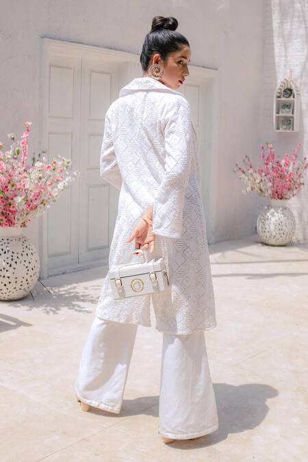 Shop Monk & Mei By Sonia Anand White Georgette Embroidery Halter Neck, Collared Inayat Jacket Pant Set at Aza Fashions Shop_Monk & Mei By Sonia Anand_White Georgette Embroidery Halter Neck, Collared Inayat Jacket Pant Set _at_Aza_Fashions