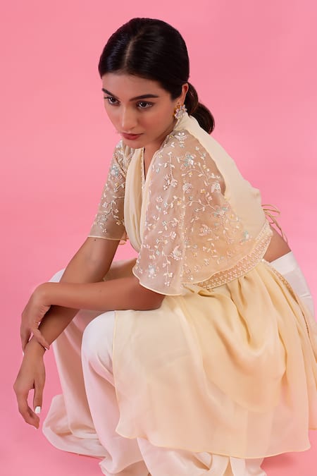 Shop PIRI INDIA Yellow Georgette Beads, Sequins, Pearls, Embroidery Sweetheart Cape Palazzo Set at Aza Fashions Shop_PIRI INDIA_Yellow Georgette Beads, Sequins, Pearls, Embroidery Sweetheart Cape Palazzo Set _at_Aza_Fashions