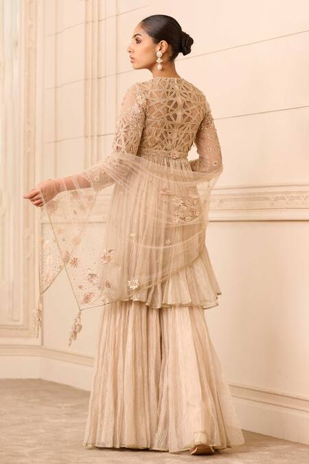 Shop Tarun Tahiliani Gold Crepe, Silk, Tulle Crystals, Embroidery Floral Flared Kurta Sharara Set at Aza Fashions Shop_Tarun Tahiliani_Gold Crepe, Silk, Tulle Crystals, Embroidery Floral Flared Kurta Sharara Set_at_Aza_Fashions