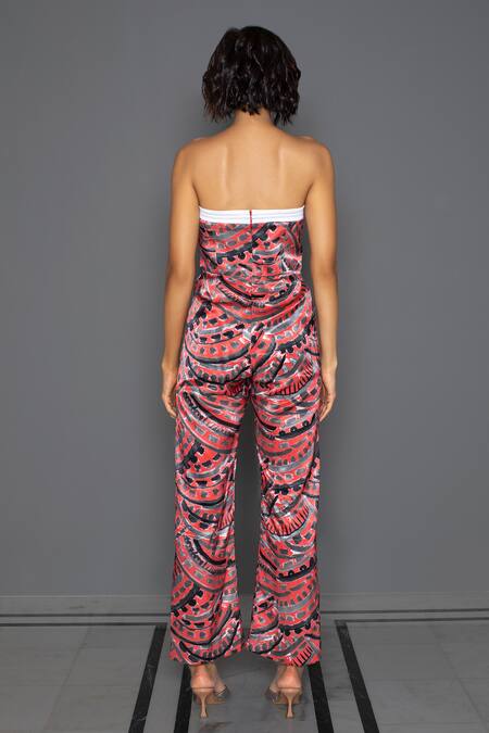 Shop Redefine Peach Mashru Silk Straight Arch Print Tube Jumpsuit at Aza Fashions Shop_Redefine_Peach Mashru Silk Straight Arch Print Tube Jumpsuit_at_Aza_Fashions