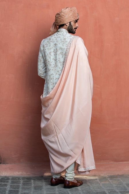 Shop Nitika Gujral Ivory Silk, Mohair, Cotton Embroidery Raw Floral Sherwani Set at Aza Fashions Shop_Nitika Gujral_Ivory Silk, Mohair, Cotton Embroidery Raw Floral Sherwani Set _at_Aza_Fashions