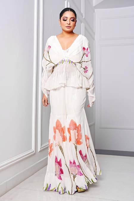 Shop Amrta By Guneet Kondal White Viscose Sequins, Pearls V-neck Embroidered Peplum Top And Sharara Set at Aza Fashions Shop_Amrta By Guneet Kondal_White Viscose Sequins, Pearls V-neck Embroidered Peplum Top And Sharara Set _at_Aza_Fashions