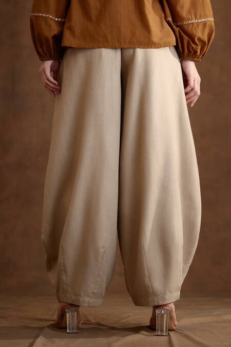 Shop_Nikasha_Beige Rayon Embroidery Placement Baggy Pant _at_Aza_Fashions