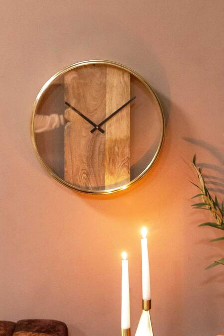Shop Logam Brown Mango Wood And Metal Plank Wall Clock at Aza Fashions Shop_Logam_Brown Mango Wood And Metal Plank Wall Clock_at_Aza_Fashions