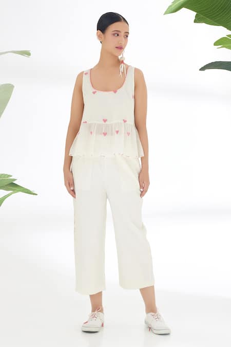 Shop Nikasha Cream Handwoven Jamdani Cotton Heart Pattern And Stitch Peplum Top And Pant Set at Aza Fashions Shop_Nikasha_Cream Handwoven Jamdani Cotton Heart Pattern And Stitch Peplum Top And Pant Set _at_Aza_Fashions