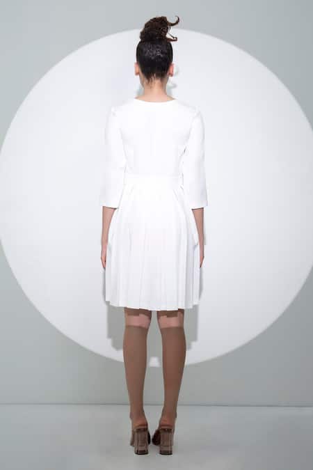 Shop Pocketful Of Cherrie White Crepe V-neck Box Pleated Three Quarter Sleeve Dress at Aza Fashions Shop_Pocketful Of Cherrie_White Crepe V-neck Box Pleated Three Quarter Sleeve Dress_at_Aza_Fashions
