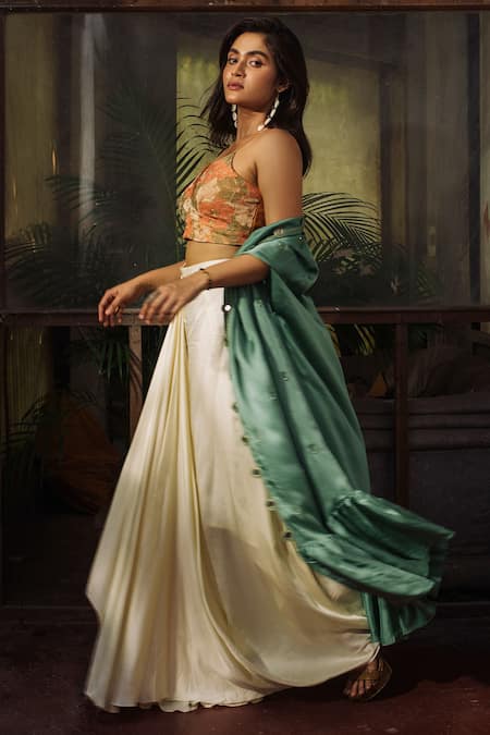 Shop Suave Blue Silk Satin Embroidery, Mirrors V-neck Border Cape Dhoti Skirt Set at Aza Fashions Shop_Suave_Blue Silk Satin Embroidery, Mirrors V-neck Border Cape Dhoti Skirt Set _at_Aza_Fashions