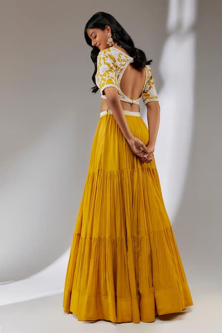 Shop Neha Khullar Yellow Chiffon, Crepe Sequins, Cut Work, Pearls, Metallic Tiered Lehenga Set at Aza Fashions Shop_Neha Khullar_Yellow Chiffon, Crepe Sequins, Cut Work, Pearls, Metallic Tiered Lehenga Set _at_Aza_Fashions