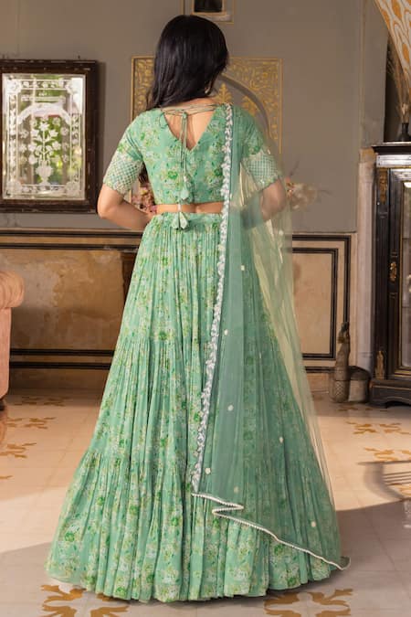 Shop Suruchi Parakh Green Georgette, Net Pearls, Beads, Sequins Floral Pattern Tiered Lehenga Set at Aza Fashions Shop_Suruchi Parakh_Green Georgette, Net Pearls, Beads, Sequins Floral Pattern Tiered Lehenga Set _at_Aza_Fashions