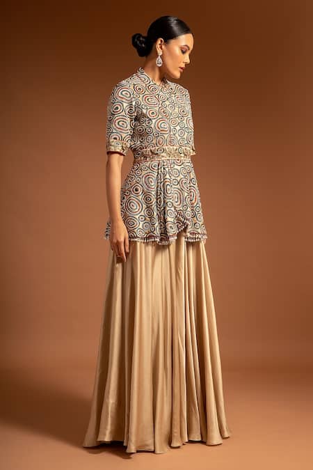 Shop Sejal Kamdar Beige Pure Satin Crepe Embellished Cutdana Ajrak Peplum Jumpsuit at Aza Fashions Shop_Sejal Kamdar_Beige Pure Satin Crepe Embellished Cutdana Ajrak Peplum Jumpsuit _at_Aza_Fashions