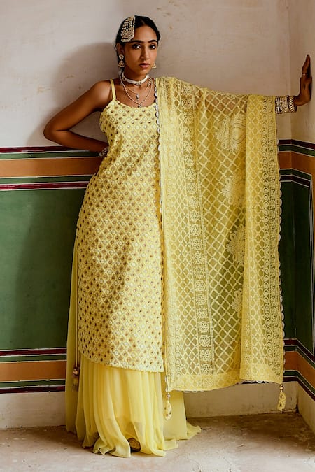 Karaj Jaipur Yellow Georgette Sequins, Embroidery, Tassels Round Chikankari Kurta Skirt Set Online at Aza Fashions Karaj Jaipur_Yellow Georgette Sequins, Embroidery, Tassels Round Chikankari Kurta Skirt Set _Online_at_Aza_Fashions