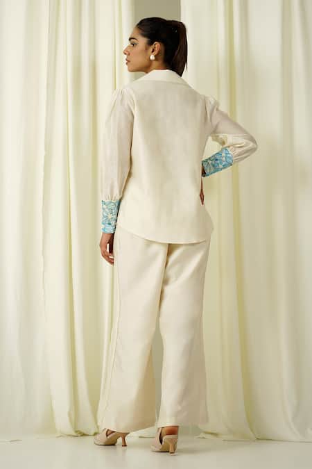 Shop_Sakshi Khetterpal_Ivory Chanderi Pearls, Beads, Embroidery Collared Shirt And Pant Set _at_Aza_Fashions