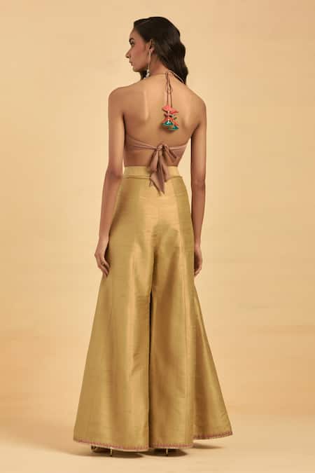 Shop Aum By Asit And Ashima Beige Silk Hand Embroidered Thread Halter Floral Panelled Sharara And Blouse Set at Aza Fashions Shop_Aum By Asit And Ashima_Beige Silk Hand Embroidered Thread Halter Floral Panelled Sharara And Blouse Set _at_Aza_Fashions