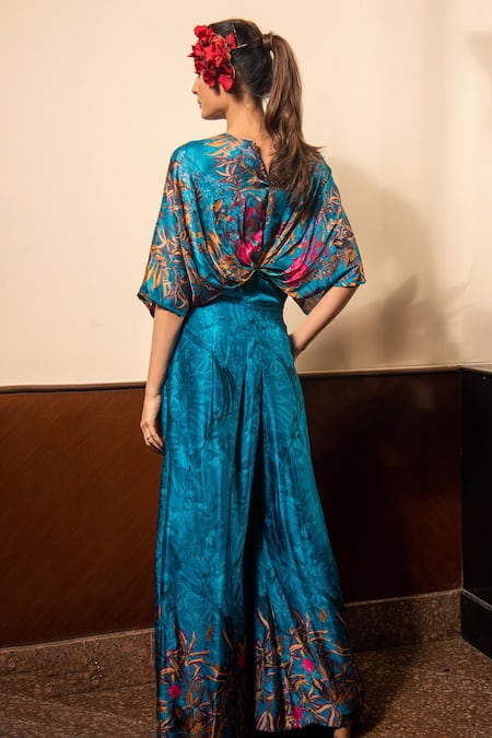 Shop_Soniya G_Blue Satin Tassels V-neck Floral Print Jumpsuit _at_Aza_Fashions