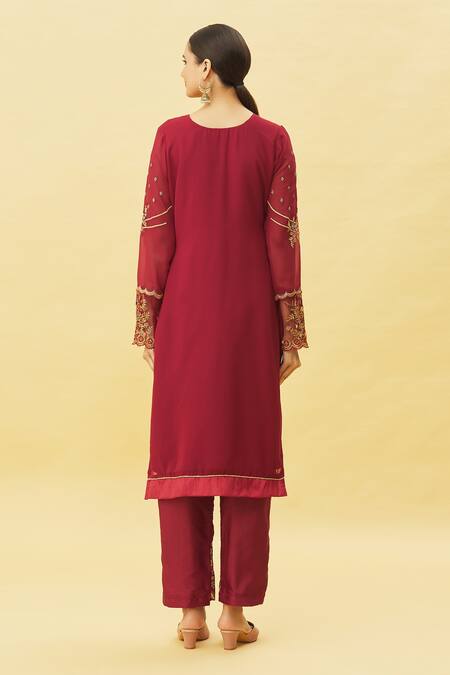 Shop Samyukta Singhania Maroon Georgette, Satin Stones, Embroidery Round Neck Floral Kurta Pant Set at Aza Fashions Shop_Samyukta Singhania_Maroon Georgette, Satin Stones, Embroidery Round Neck Floral Kurta Pant Set_at_Aza_Fashions