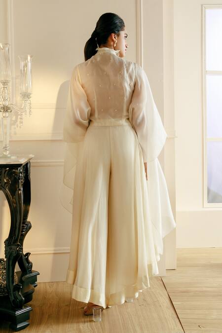 Shop Nehha Nhata Off White Organza Embroidery High Neck 3d Floral Top And Asymmetric Pant Set at Aza Fashions Shop_Nehha Nhata_Off White Organza Embroidery High Neck 3d Floral Top And Asymmetric Pant Set _at_Aza_Fashions