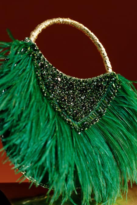 Shop Be Chic Green Crystals, Sequins, Feathers Fiery Half Crescent Shaped Embellished Clutch at Aza Fashions Shop_Be Chic_Green Crystals, Sequins, Feathers Fiery Half Crescent Shaped Embellished Clutch _at_Aza_Fashions