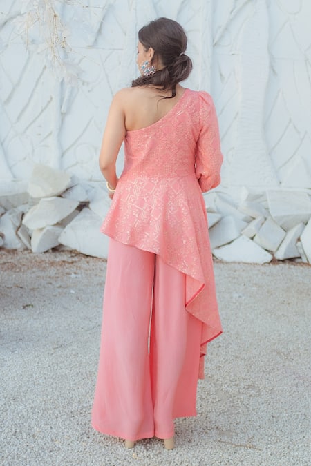 Shop Monk & Mei By Sonia Anand Peach Georgette Sequins, Pearls One Shoulder High Low Top And Palazzo Set at Aza Fashions Shop_Monk & Mei By Sonia Anand_Peach Georgette Sequins, Pearls One Shoulder High Low Top And Palazzo Set _at_Aza_Fashions
