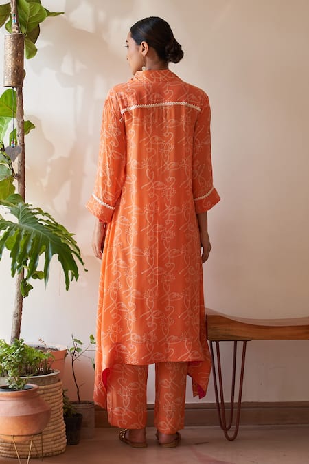 Shop Rekha Agra Orange Cotton, Crepe Pearls Collared Lotus Print Asymmetric Kaftan With Pant at Aza Fashions Shop_Rekha Agra_Orange Cotton, Crepe Pearls Collared Lotus Print Asymmetric Kaftan With Pant _at_Aza_Fashions