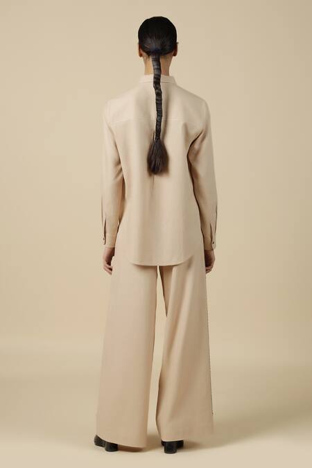 Shop Shahin Mannan Beige Linen Embroidery Measuring Tape Flared Pant at Aza Fashions Shop_Shahin Mannan_Beige Linen Embroidery Measuring Tape Flared Pant _at_Aza_Fashions