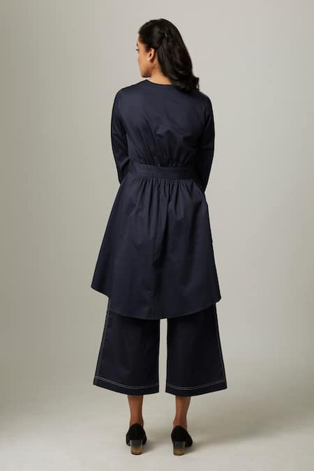 Shop Escape By Aishwarya Blue Cotton Satin V-neck Asymmetric High Low Wrap Top at Aza Fashions Shop_Escape By Aishwarya_Blue Cotton Satin V-neck Asymmetric High Low Wrap Top _at_Aza_Fashions