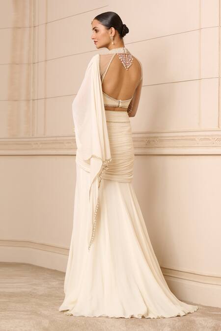 Shop Tarun Tahiliani Ivory Silk, Chiffon Embroidery Concept Pre-draped Saree With Fluted Blouse at Aza Fashions Shop_Tarun Tahiliani_Ivory Silk, Chiffon Embroidery Concept Pre-draped Saree With Fluted Blouse_at_Aza_Fashions