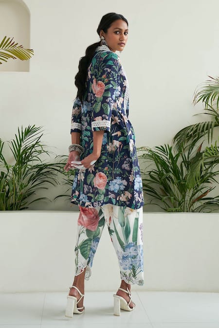 Shop Sage Saga Blue Chanderi Embroidery, Lace V-neck Iris Floral Print Tunic Tulip Salwar Set at Aza Fashions Shop_Sage Saga_Blue Chanderi Embroidery, Lace V-neck Iris Floral Print Tunic Tulip Salwar Set _at_Aza_Fashions