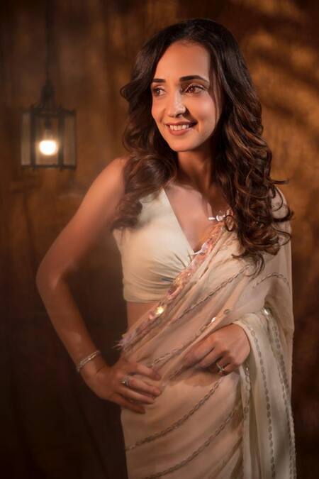 Shop_Neeta Lulla_Peach Georgette Sequins Plunge V Neck Work Saree With Sleeveless Blouse_at_Aza_Fashions