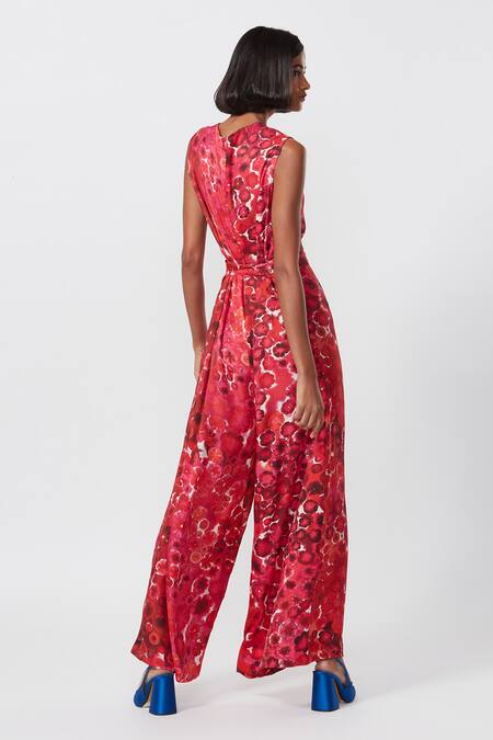 Shop Saaksha & Kinni Red Satin Print Floral Bloom V Neck Jumpsuit at Aza Fashions Shop_Saaksha & Kinni_Red Satin Print Floral Bloom V Neck Jumpsuit_at_Aza_Fashions