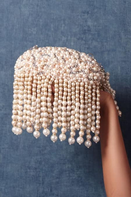 Shop_Forever Noor_Beige Embellished Zuri Oval Clutch _at_Aza_Fashions