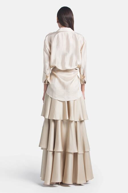 Shop 431-88 By Shweta Kapur Beige Satin Multi Layered Skirt at Aza Fashions Shop_431-88 By Shweta Kapur_Beige Satin Multi Layered Skirt_at_Aza_Fashions