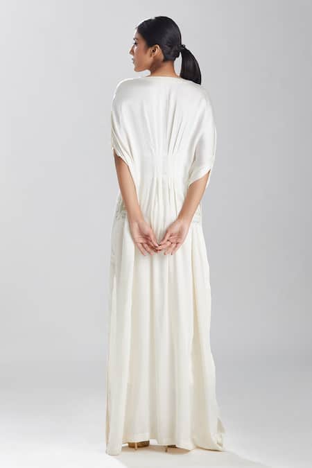 Shop Megha Bansal Ivory Satin Cut Dana, Sequin And Beads Work V Neck Motia Azmina Kaftan Gown at Aza Fashions Shop_Megha Bansal_Ivory Satin Cut Dana, Sequin And Beads Work V Neck Motia Azmina Kaftan Gown _at_Aza_Fashions