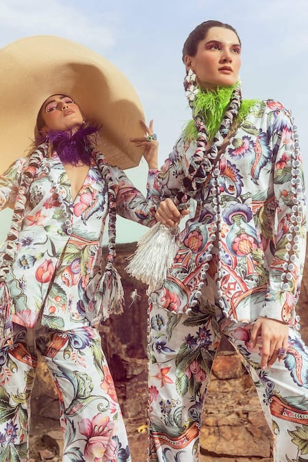 Shop Akanksha Mago Multi Color Cotton Embroidery V-neck Printed Peplum Top And Bell Bottom Pant Set at Aza Fashions Shop_Akanksha Mago_Multi Color Cotton Embroidery V-neck Printed Peplum Top And Bell Bottom Pant Set _at_Aza_Fashions