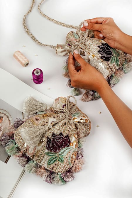 Shop Payal Singhal Accessories Cream Embroidery Lotus Design Potli - Single Pc at Aza Fashions Shop_Payal Singhal Accessories_Cream Embroidery Lotus Design Potli - Single Pc_at_Aza_Fashions