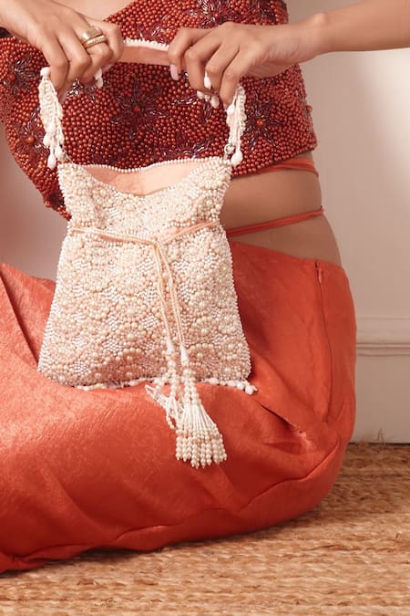 Shop Forever Noor Peach Embellished Paisley Handcrafted Potli Bag at Aza Fashions Shop_Forever Noor_Peach Embellished Paisley Handcrafted Potli Bag _at_Aza_Fashions