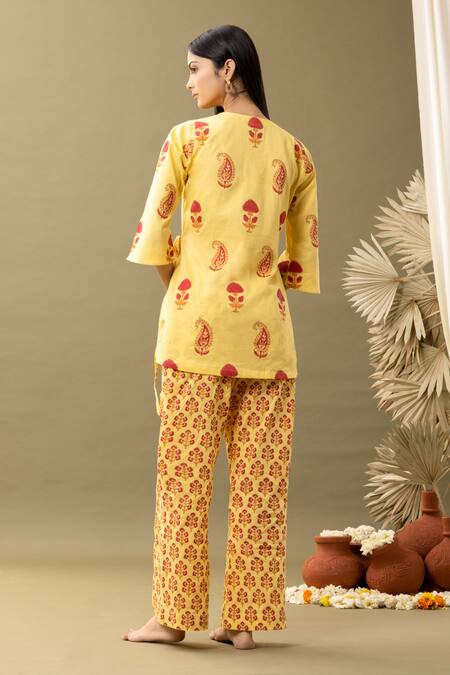 Shop_Abbaran_Yellow Cotton Embroidery V-neck Bloom Print Angrakha And Pant Set _at_Aza_Fashions