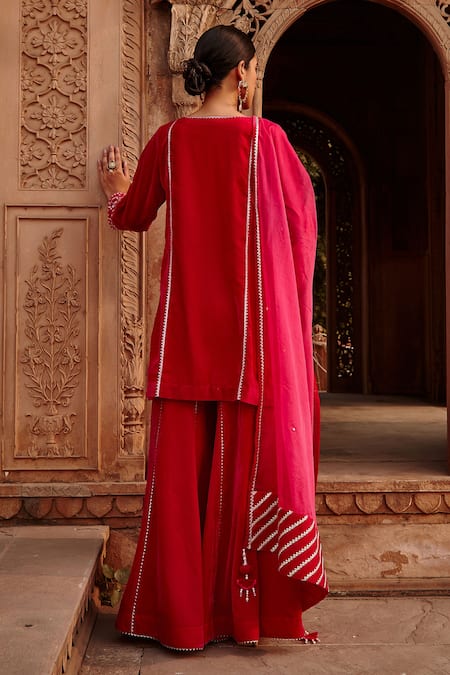 Shop Ajiesh Oberoi Pink Velvet, Organza Sequins, Beads, Embroidery Round Short Kurta Gharara Set at Aza Fashions Shop_Ajiesh Oberoi_Pink Velvet, Organza Sequins, Beads, Embroidery Round Short Kurta Gharara Set _at_Aza_Fashions
