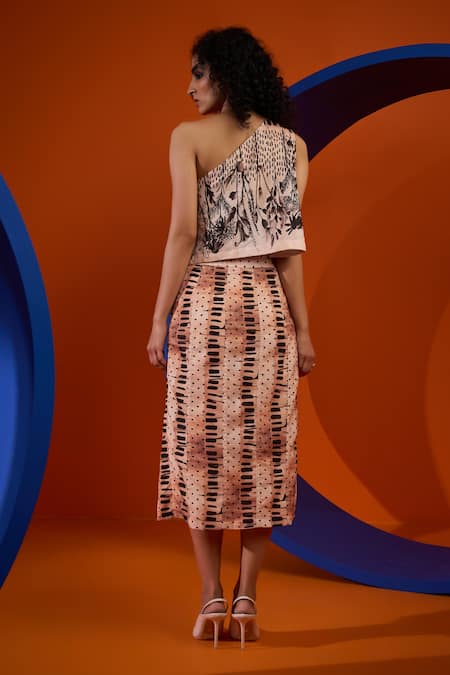 Shop The Dramebaaz CO Ivory Cotton, Silk Embroidery Asymmetric Calla One Shoulder Top And Skirt Set at Aza Fashions Shop_The Dramebaaz CO_Ivory Cotton, Silk Embroidery Asymmetric Calla One Shoulder Top And Skirt Set _at_Aza_Fashions