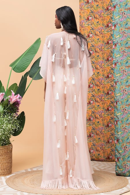 Shop Rishi and Vibhuti Pink Linen, Organza Pearls, Tassels V-neck Aurora Embellished Cape And Pant Set at Aza Fashions Shop_Rishi and Vibhuti_Pink Linen, Organza Pearls, Tassels V-neck Aurora Embellished Cape And Pant Set _at_Aza_Fashions