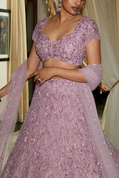 Shop Nadine Dhody Purple Tulle Sequins, Cut Work, Helene Crystal And Feather Embroidered Lehenga Set at Aza Fashions Shop_Nadine Dhody_Purple Tulle Sequins, Cut Work, Helene Crystal And Feather Embroidered Lehenga Set _at_Aza_Fashions
