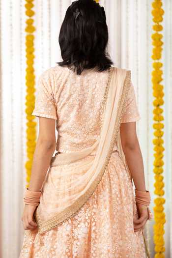 Shop Free Sparrow Peach Cotton, Canvas, Net Tassels, Embroidery Thread Lehenga Set at Aza Fashions Shop_Free Sparrow_Peach Cotton, Canvas, Net Tassels, Embroidery Thread Lehenga Set _at_Aza_Fashions