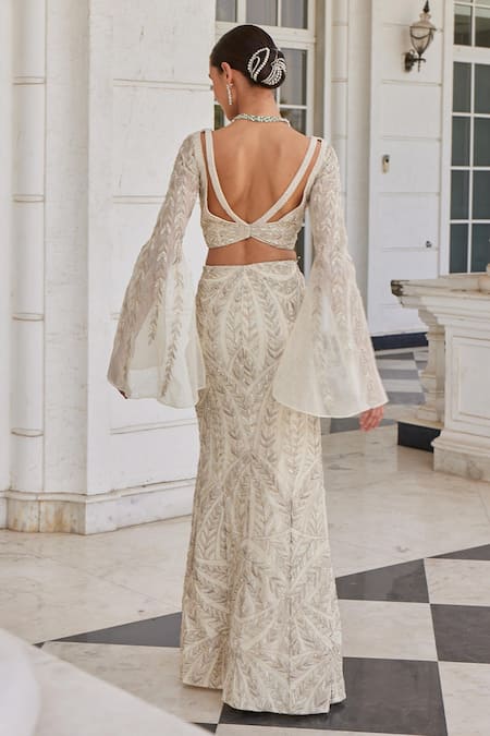 Shop_Charu And Vasundhara_Ivory Net, Organza Cut Work, Saia Bell Sleeve Embroidered Blouse And Skirt Set _at_Aza_Fashions