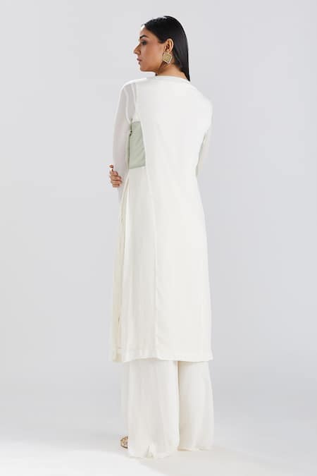 Shop Megha Bansal Ivory Chiffon, Organza, Chanderi Motia Nyra Embroidered Palazzo Set at Aza Fashions Shop_Megha Bansal_Ivory Chiffon, Organza, Chanderi Motia Nyra Embroidered Palazzo Set _at_Aza_Fashions