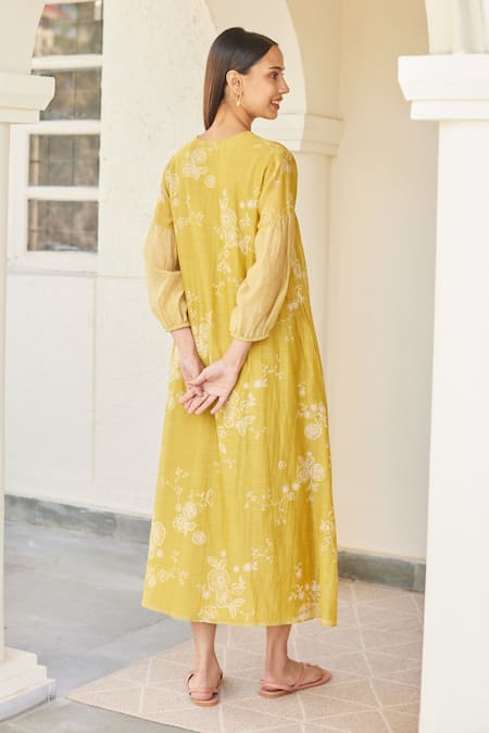 Shop Vaayu Yellow Cotton, Muslin Embroidery V-neck Floral Print Dress at Aza Fashions Shop_Vaayu_Yellow Cotton, Muslin Embroidery V-neck Floral Print Dress _at_Aza_Fashions