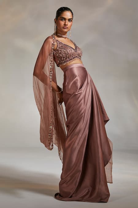 Shop Divya Aggarwal Pink Satin Sequins, Cut Work V-neck Viven Hand Embroidered Cape Skirt Set at Aza Fashions Shop_Divya Aggarwal_Pink Satin Sequins, Cut Work V-neck Viven Hand Embroidered Cape Skirt Set _at_Aza_Fashions