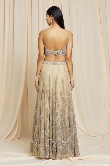 Shop Izzumi Mehta Beige Net Floral Plunge V Neck Hand Embroidered Lehenga Choli Set at Aza Fashions Shop_Izzumi Mehta_Beige Net Floral Plunge V Neck Hand Embroidered Lehenga Choli Set _at_Aza_Fashions