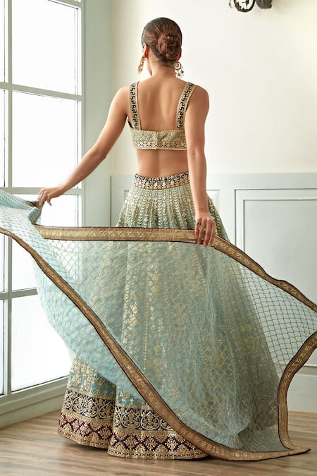 Shop Studio Iris India Blue Organza Embroidery, Sequins Plunge Neck Morni Floral Pattern Lehenga Set at Aza Fashions Shop_Studio Iris India_Blue Organza Embroidery, Sequins Plunge Neck Morni Floral Pattern Lehenga Set _at_Aza_Fashions