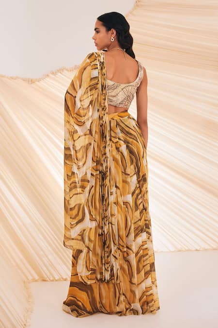 Shop Divya Aggarwal Yellow Chiffon Pearls, Mirrors V-neck Verity Embroidered Blouse With Skirt at Aza Fashions Shop_Divya Aggarwal_Yellow Chiffon Pearls, Mirrors V-neck Verity Embroidered Blouse With Skirt _at_Aza_Fashions