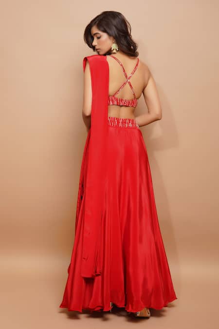 Ahi Clothing Red Crepe Sequins, Cut Work, Zari Hand Embroidered Bustier And Lehenga Set Online at Aza Fashions Ahi Clothing_Red Crepe Sequins, Cut Work, Zari Hand Embroidered Bustier And Lehenga Set _Online_at_Aza_Fashions