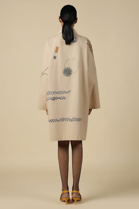 Shop Shahin Mannan Beige Poplin Embroidery Split V-neck Abstract Shapes Oversized Jacket Dress at Aza Fashions Shop_Shahin Mannan_Beige Poplin Embroidery Split V-neck Abstract Shapes Oversized Jacket Dress _at_Aza_Fashions